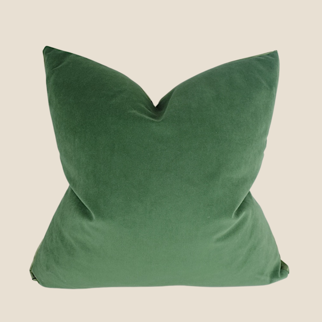a green velvet handmade cushion